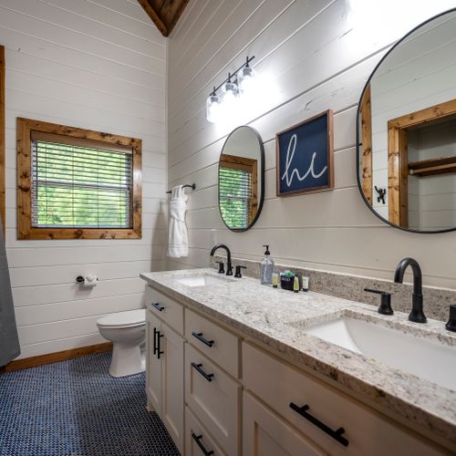 Just outside the bunk room is a full bathroom with double vanities!