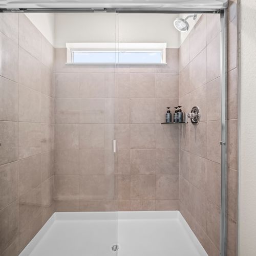 Ensuite bathroom with spacious walk-in shower.