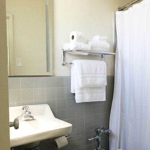 Our sparkling clean bathroom is fully stocked with fresh, fluffy towels and essential toiletries, ensuring a refreshing and comfortable start or end to your day.
