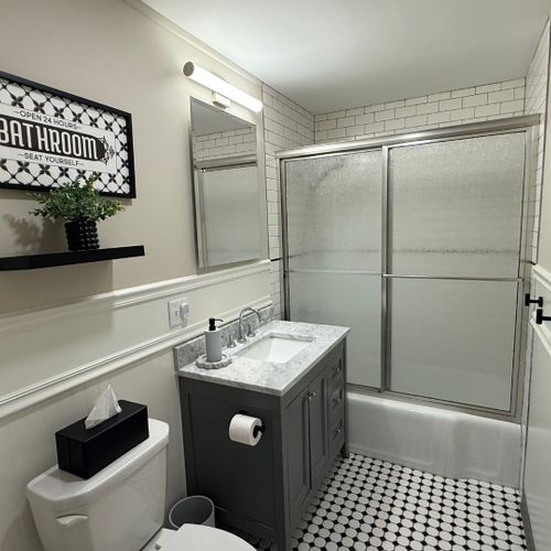 Bathroom #2:  common full bathroom with a combination tub and shower.