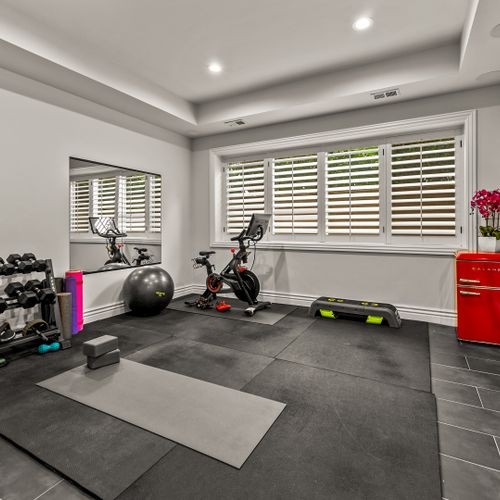 Stay on top of your fitness goals with a dedicated gym space