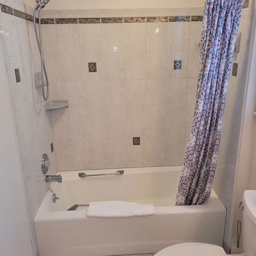 Bathroom #1 (main floor):  full bathroom with a combination tub and shower.