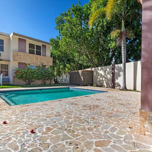 Welcome to your home away from home. Our beautiful house features a stunning private pool, ideal for cooling off and making lasting memories.