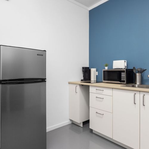 Culinary Comforts: Prepare delicious meals with ease in our well-equipped Airbnb kitchen, featuring modern appliances and all the essentials for your home-away-from-home cooking.