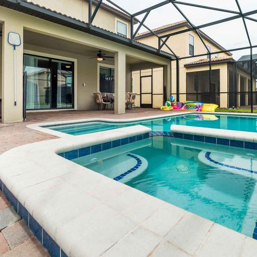 Property pool with hot tub