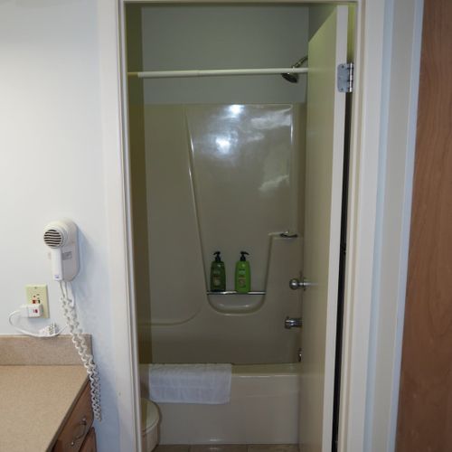 Master bathroom:  this is the private en-suite bathroom for the master bedroom. It's a full bathroom with a combination tub and shower. Note that there is a door that separates the combination tub / shower and toilet from the rest of the bathroom.