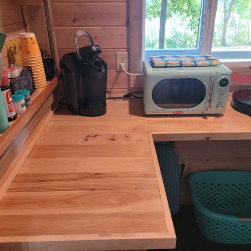 Living area:  kitchenette with counter, keurig coffee maker, microwave, and stovetop