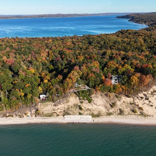 EXTERIOR:  The cottage sits between Lake Michigan and Crystal Lake, with a gorgeous view looking out over Lake Michigan