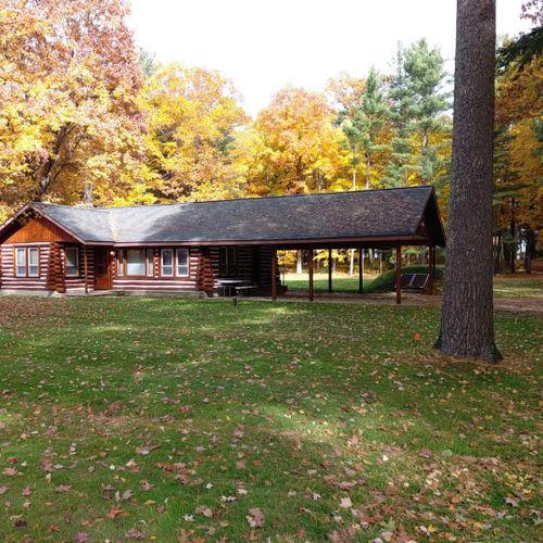 Exterior:  another view of the front of the cabin in fall.