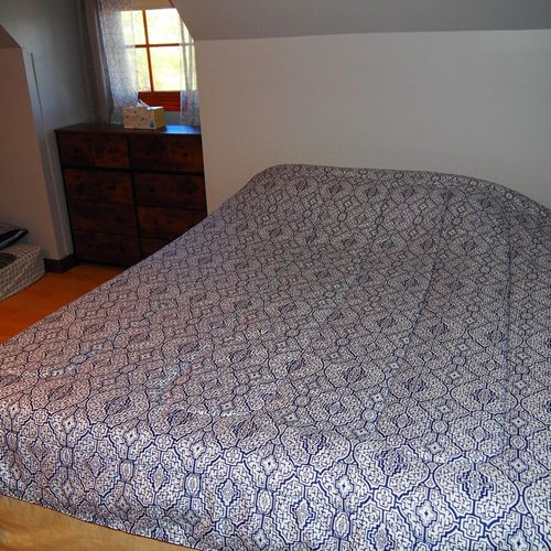 Bedroom #3 (second floor):  includes a queen-size bed, a full-size bed, and a twin-on-full bunk bed. Also has a dresser. Closet, and ceiling fan.