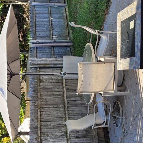 Exterior:  the outdoor dining furniture and the fire table.