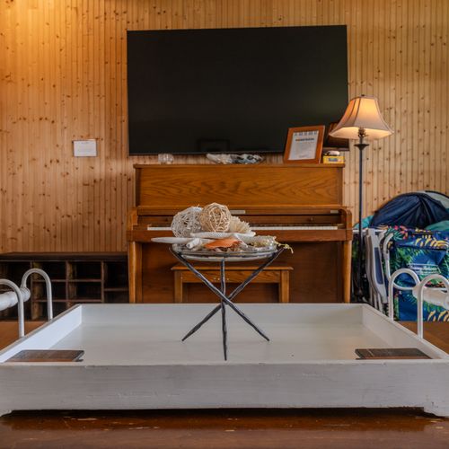 Kick back and relax in the cozy living room with a movie or play or tune or two on the piano!