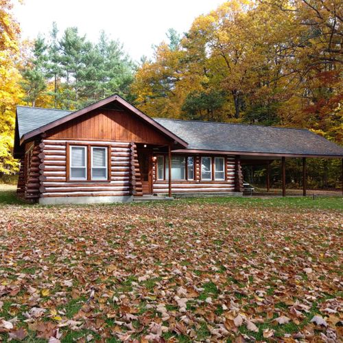 Exterior:  another view of the front of the cabin in fall.