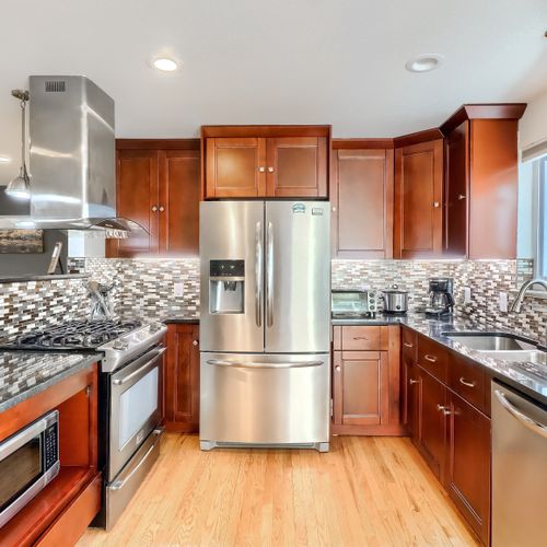 The beautifully updated kitchen provides ample room for your entire group to cook and entertain.