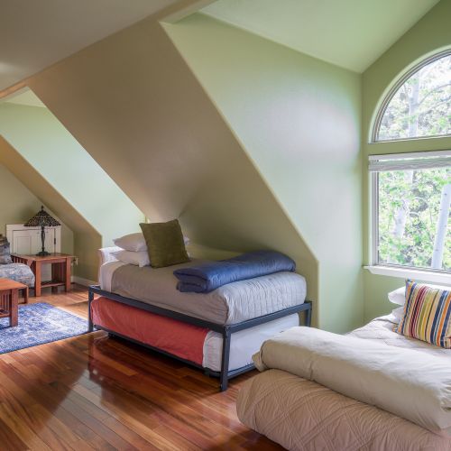 Lounge area with plenty of extra beds and linens