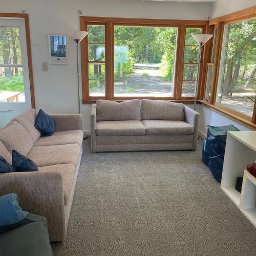 Living room:  the cottage has a very comfy and cozy living room with a sofa, loveseat, comfy chair, and television.