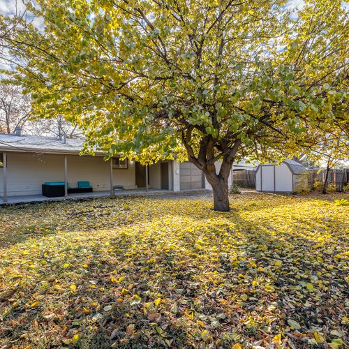 The large fenced-in yard provides a safe space for kids and furry friends to roam freely while you take in the colorado sunshine.