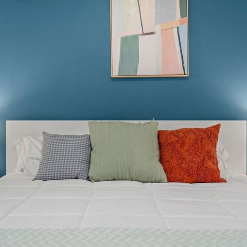 This cozy bedroom invites you to relax and rejuvenate.