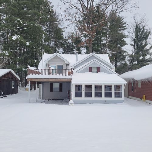 Exterior:  another view of the front of the home in winter.