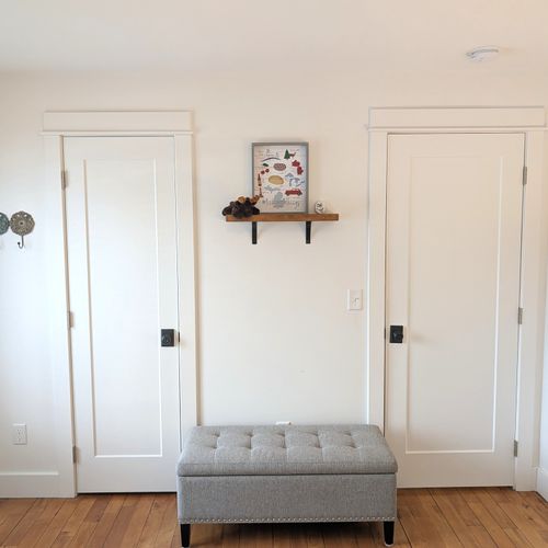 BEDROOM #2 (MAIN FLOOR):  This is a second main floor bedroom that also has a queen-size bed, nightstands, lamps, dresser, mirror, and a closet.