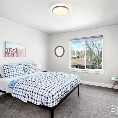 Rest comfortably on the king-size bed with high-end linens and plush carpeting