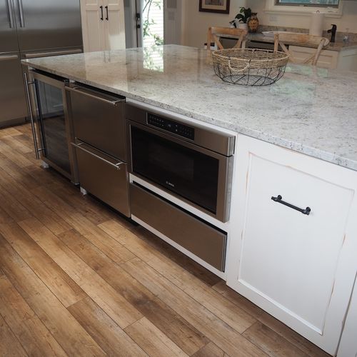 Kitchen:  a second oven, dish drawers, and wine cooler are below the kitchen island.
