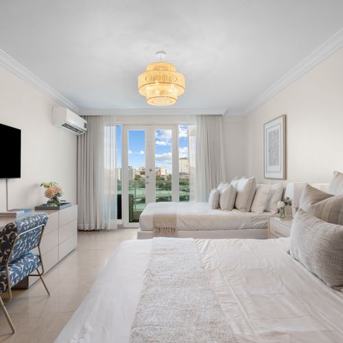 Ideal for families or friends. Enjoy spacious sleeping with two comfortable beds.