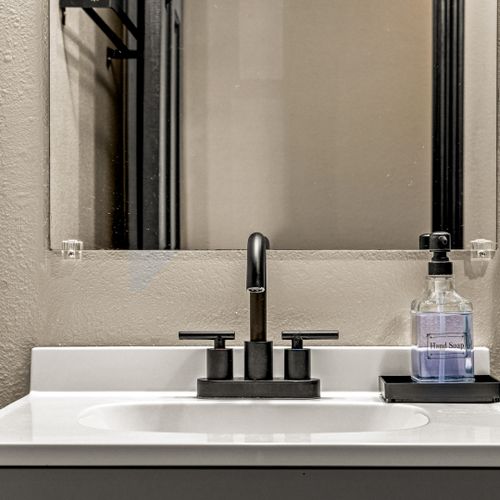 Each bathroom is stylish and functional.