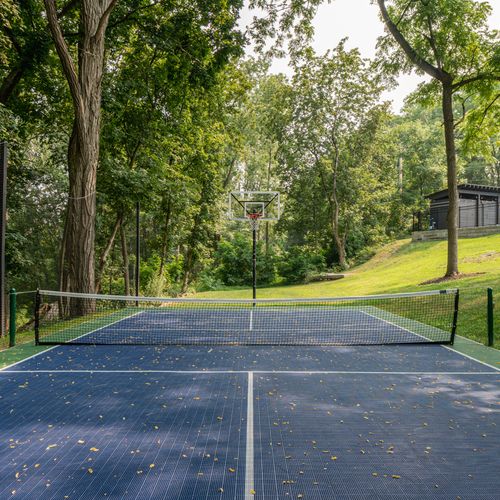 Dual pickleball and basketball court for your favorite form of play.