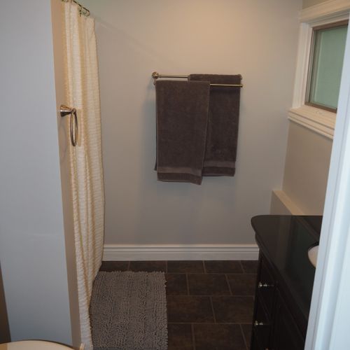 Bathroom #2 (first floor):  full private en suite bathroom for bedroom #2.