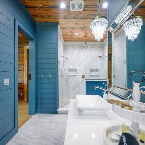 Double vanity and double-head walk-in shower.