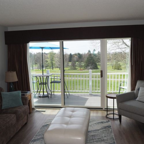 Living room:  features a sofa, comfy chair, ottoman, large screen television, and a desk and chair. (note that guest usage of the fireplace in the living room is strictly prohibited. )