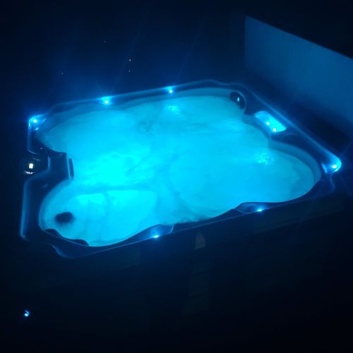 Exterior:  the hot tub can be easily changed to multiple different romantic colors at night.