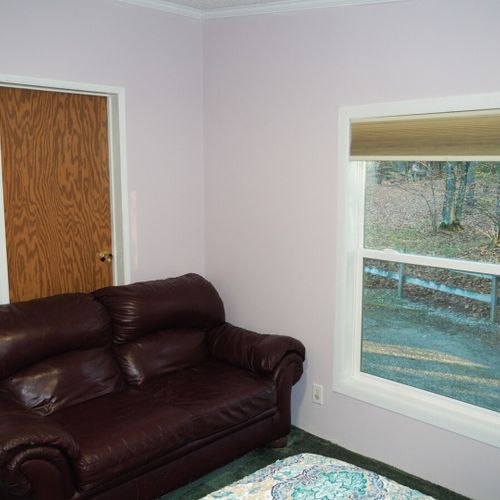 Bedroom #3:  the sofa in the bedroom and the bedroom window, which faces the side of the house. Note that the closet that is shown is used for storage and is not available for guest usage.