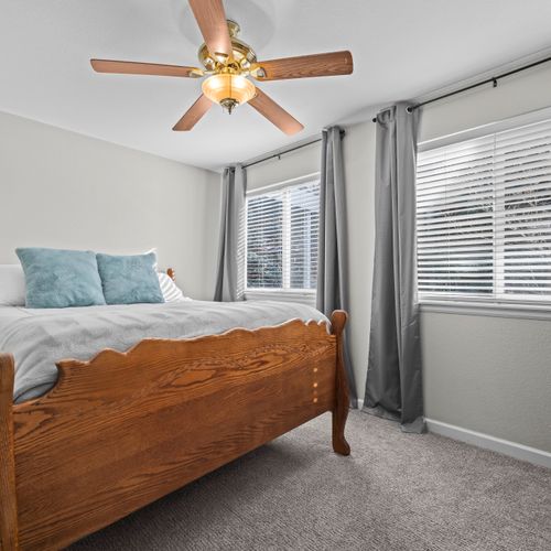 Comfortable sleeping space with window views