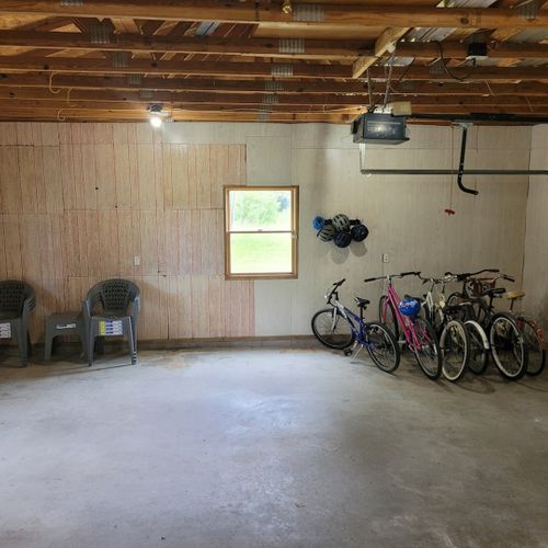 Garage:  guests are welcome to use the garage, which includes space for a vehicle, bicycles that are available for guests to use, and extra outdoor chairs that are available for guests to use.
