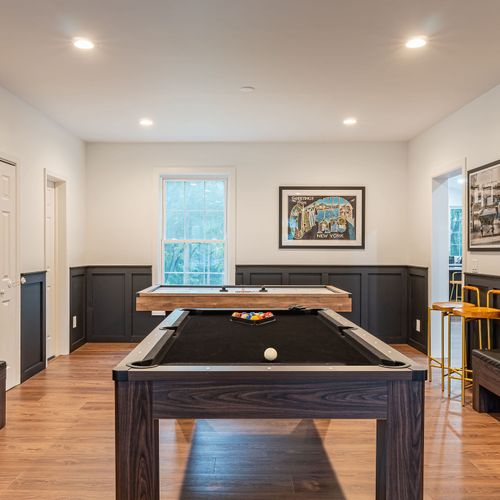 A fully-furnished gameroom with TV, billiards, fooseball, and a poker table!