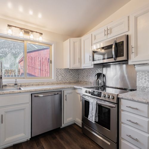 Huge kitchen with stainless steal appliances and all necessary essentials.