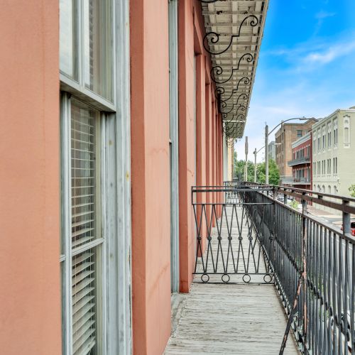 Sip your morning coffee on the balcony overlooking Girod Street.