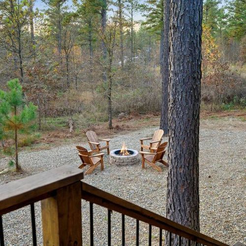The fire pit with 4 Adirondack chairs!
