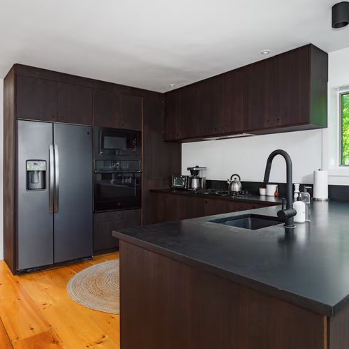 Head upstairs to the main floor and find yourself in the kitchen