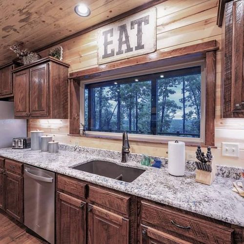 The kitchen features updated amenities and lots of counter space.