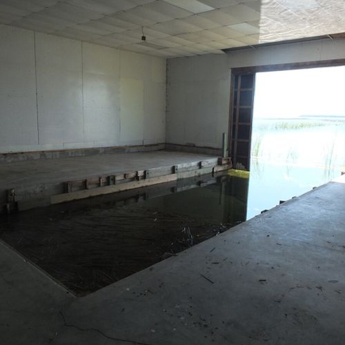 Exterior:  the interior of the boat house. (please note that the level of lake huron varies significantly. As such, the boat house may or may not be usable by boats depending upon the lake level. )