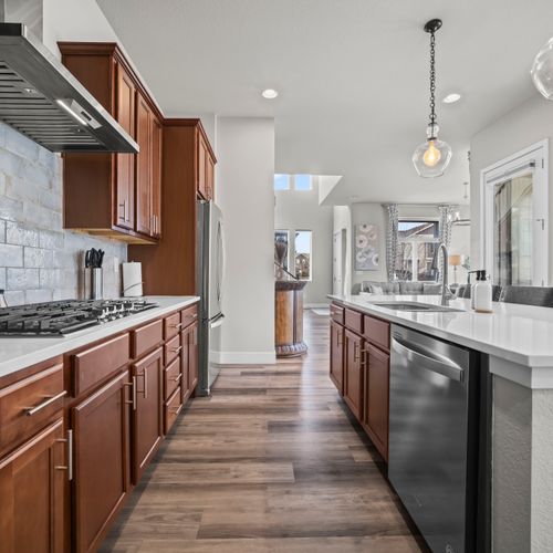 Bright kitchen with plenty of counter space to cook together.