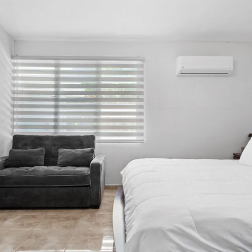 Unwind here: Tastefully decorated bedroom for ultimate relaxation.