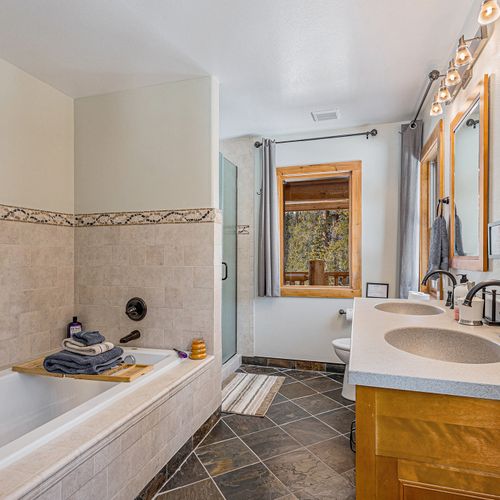 Experience spa-like serenity: our ensuite bathroom is a retreat within a retreat