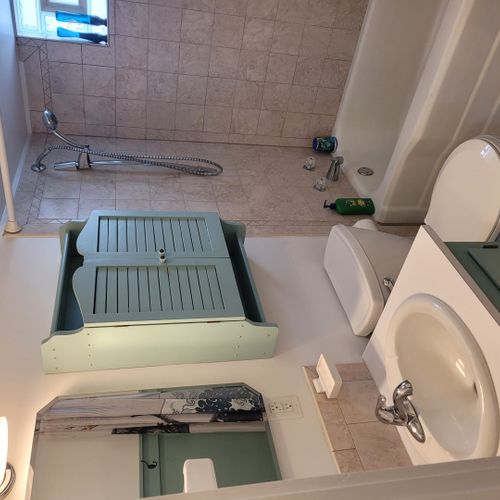 Bathroom #1:  full bathroom with a combination tub and shower.