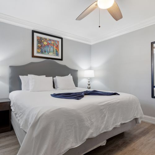 Crisp, cozy bed dressed in fresh white linens