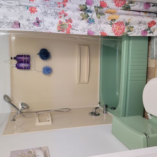 Bathroom #1 (first floor):  full bathroom on the first floor with a combination tub and shower.