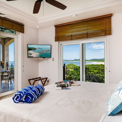 Master Bedroom with king-size bed and ocean view